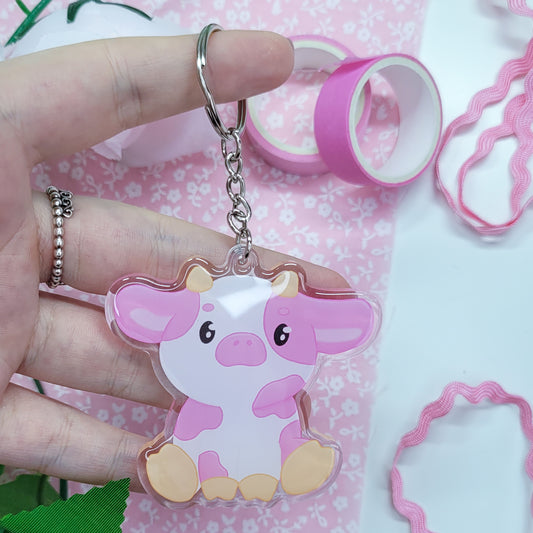 Cute pink cow acryllic keychain with resin on the front side