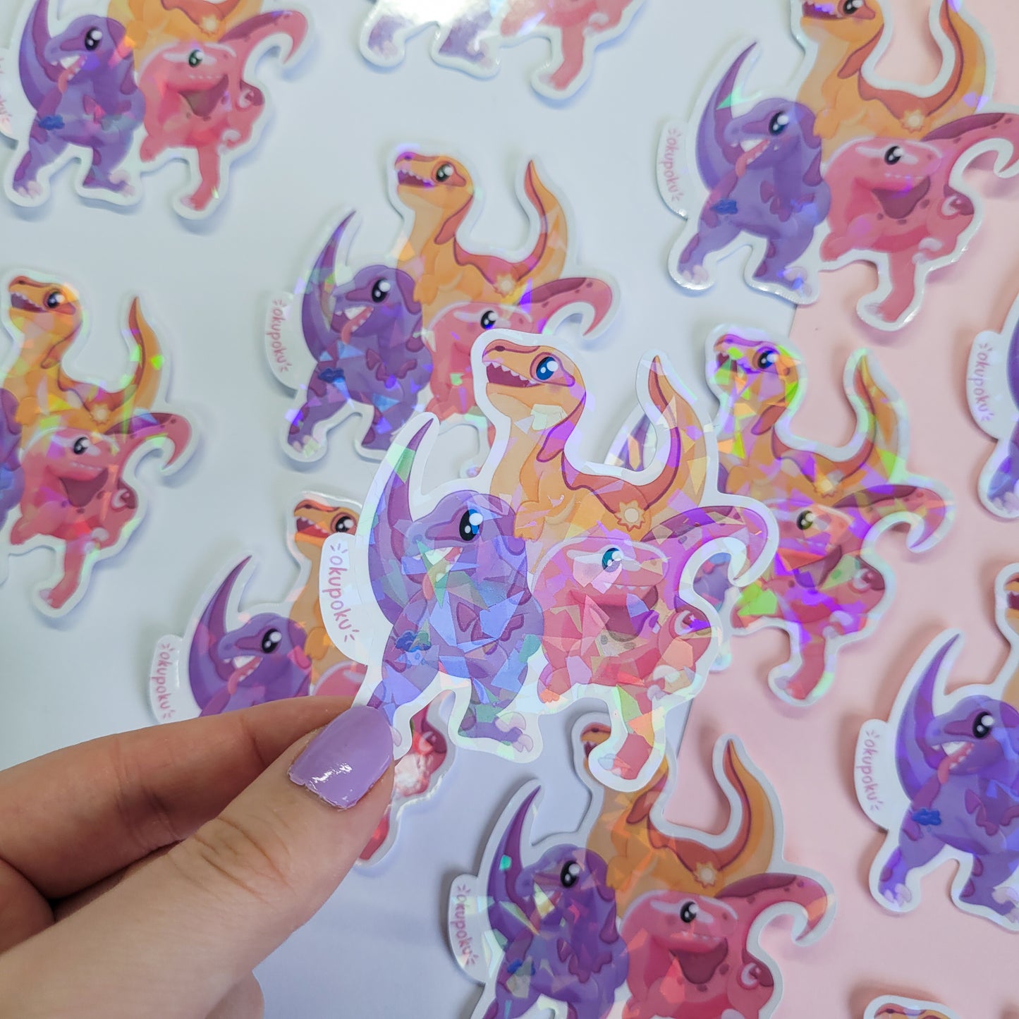 cute trio of velociraptors sticker