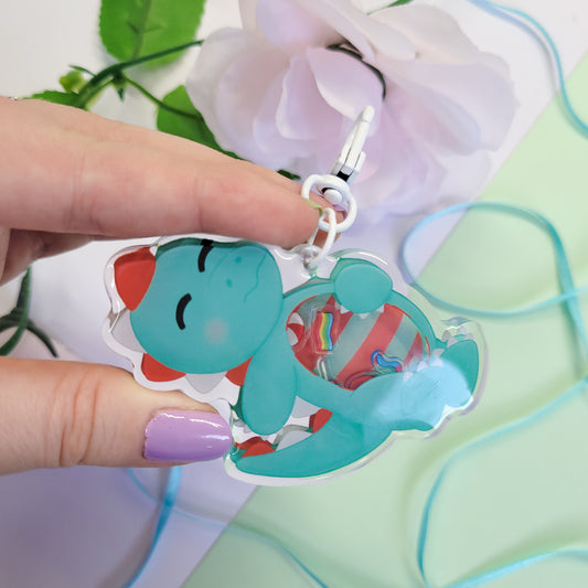 Peppermint T-Rex shaker keychain with a belly full of sweets