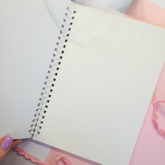 reusable sticker book with a Poké Ball design and 'Gotcha!' text on a pink background