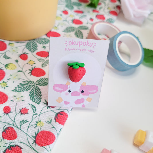 Cute strawberry pin badge made out of polymer clay