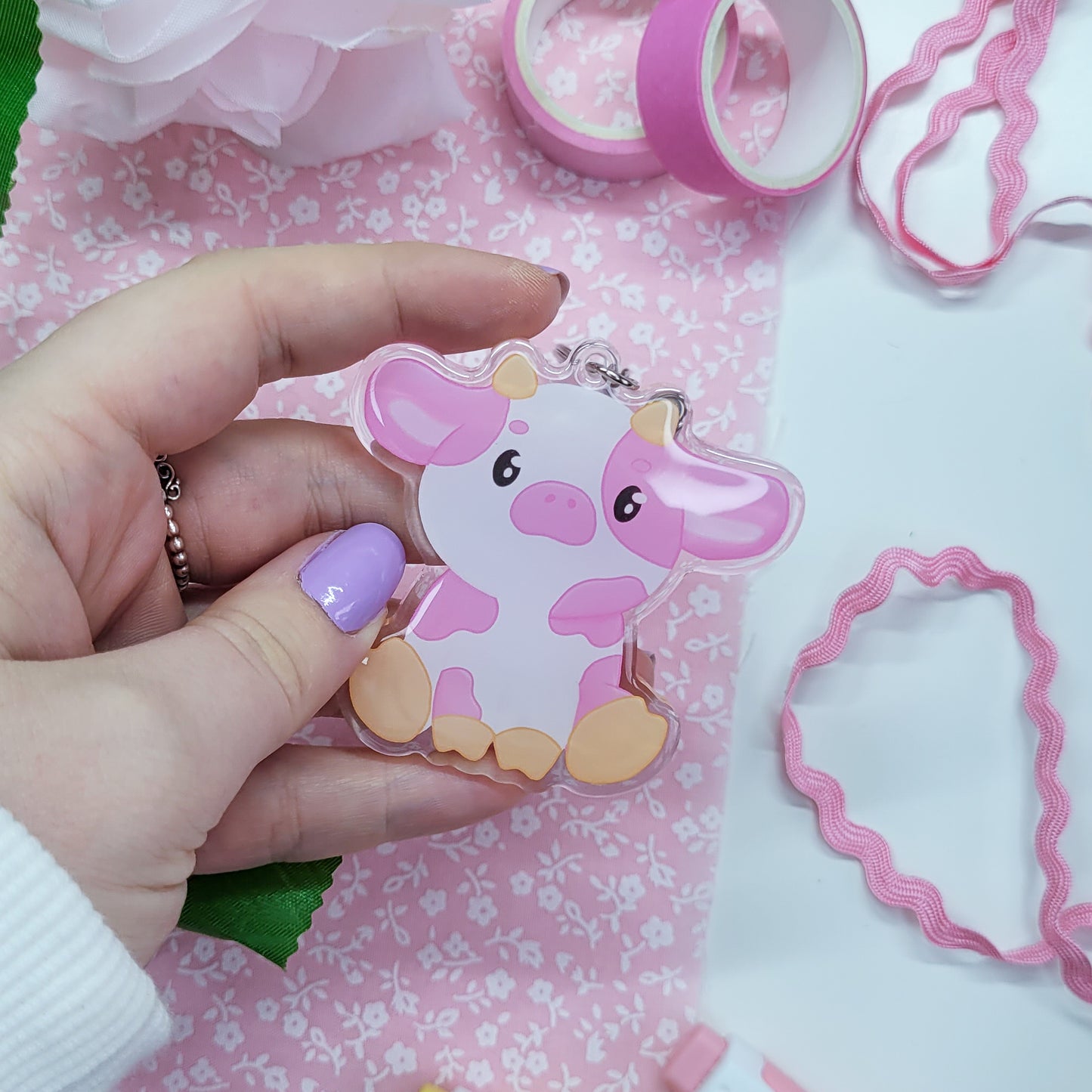 Cute pink cow acryllic keychain with resin on the front side