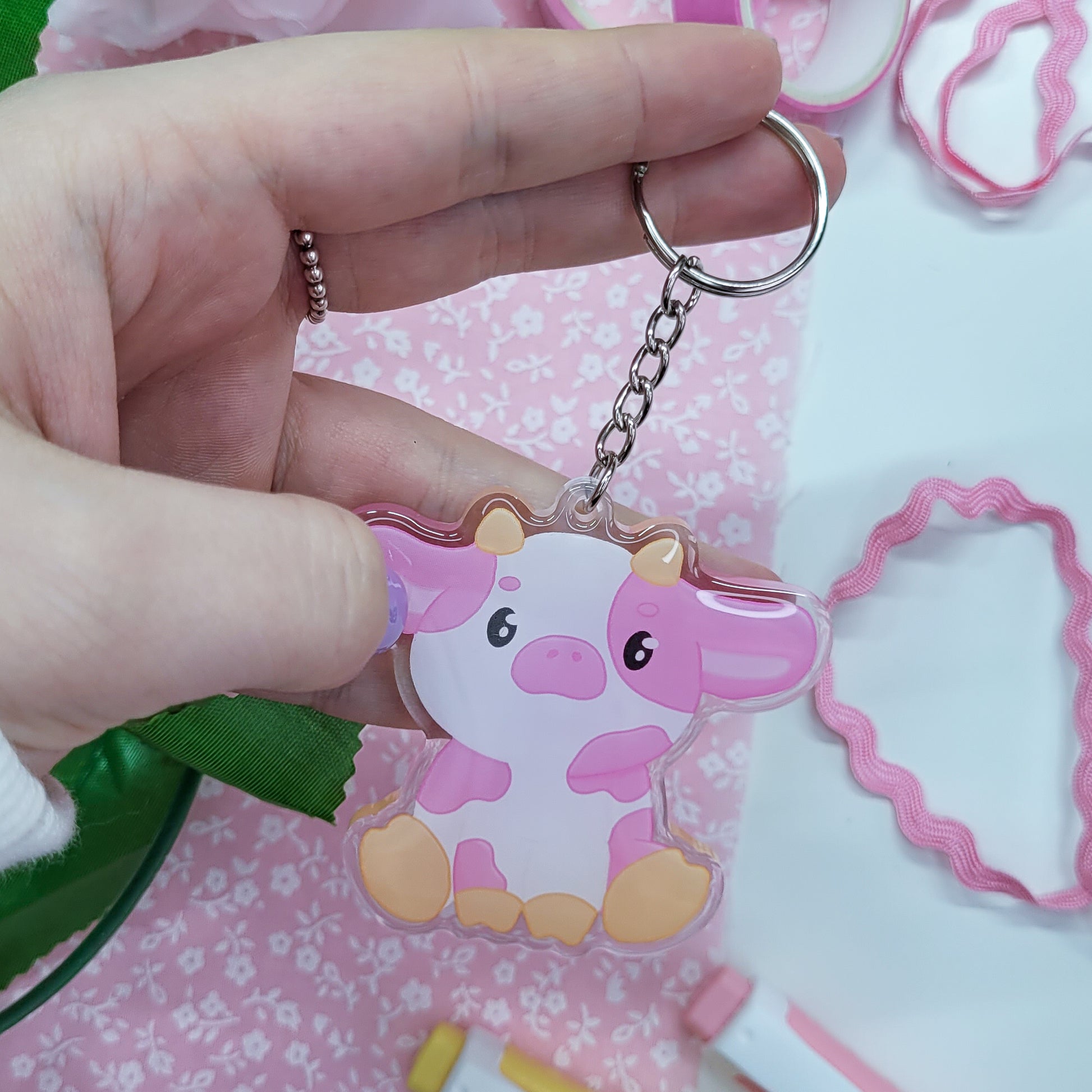 Cute pink cow acryllic keychain with resin on the front side