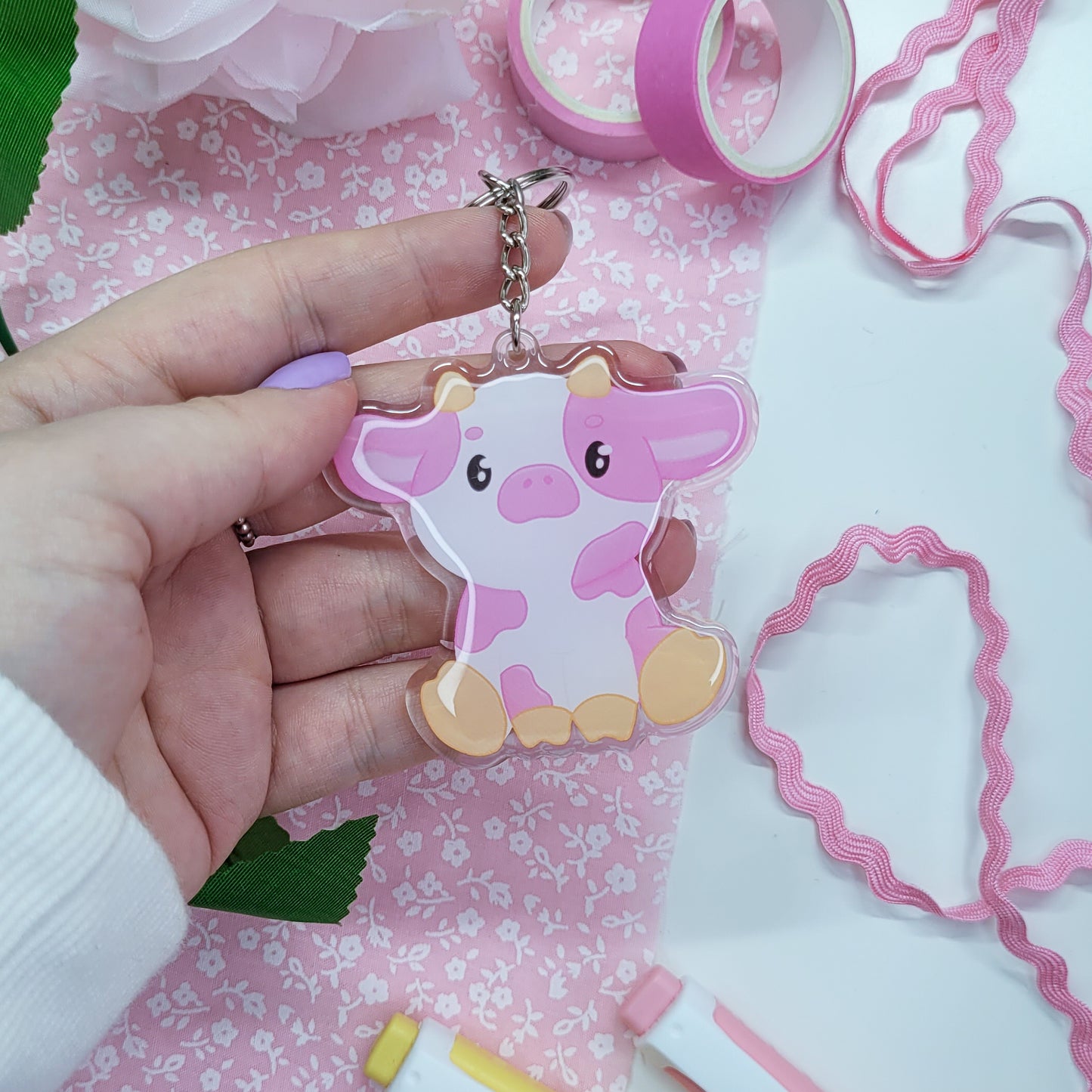 Cute pink cow acryllic keychain with resin on the front side