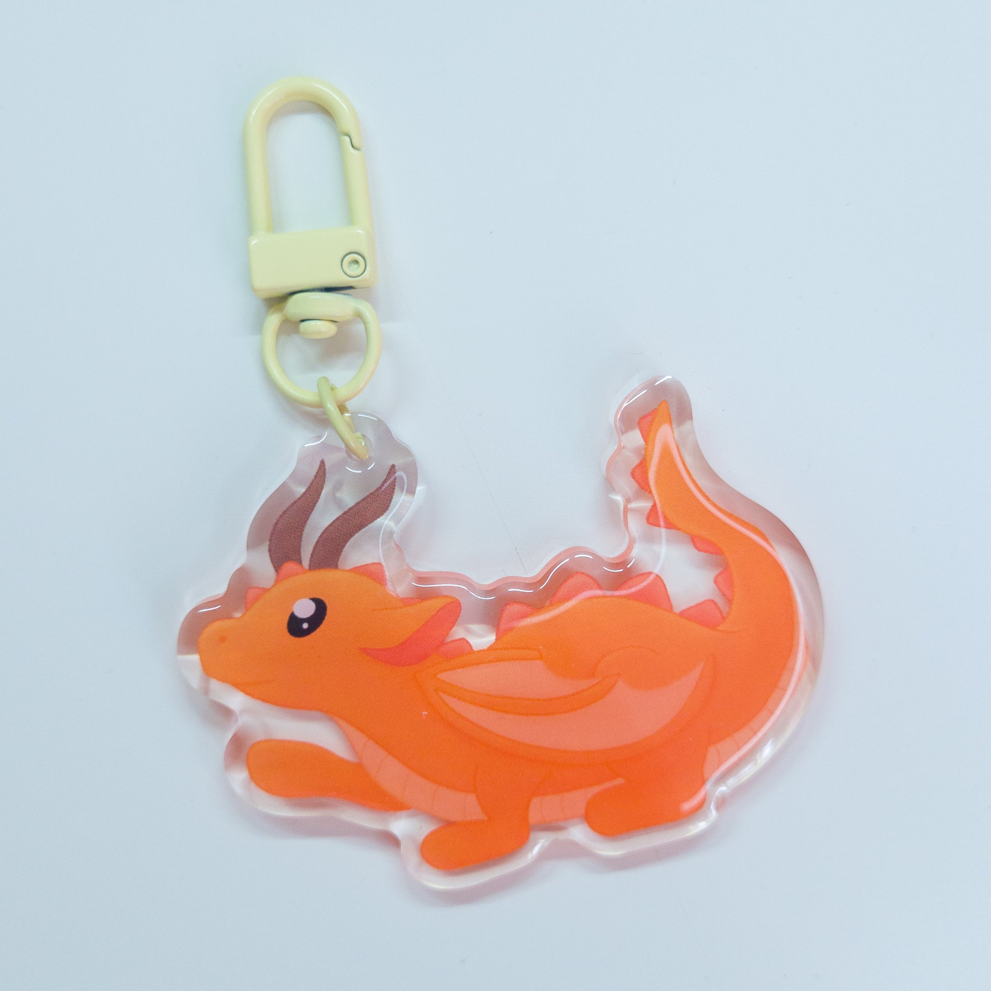Cute orange forest dragon keychain called mimo