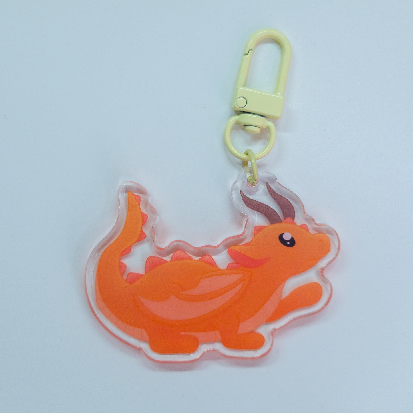 Cute orange forest dragon keychain called mimo
