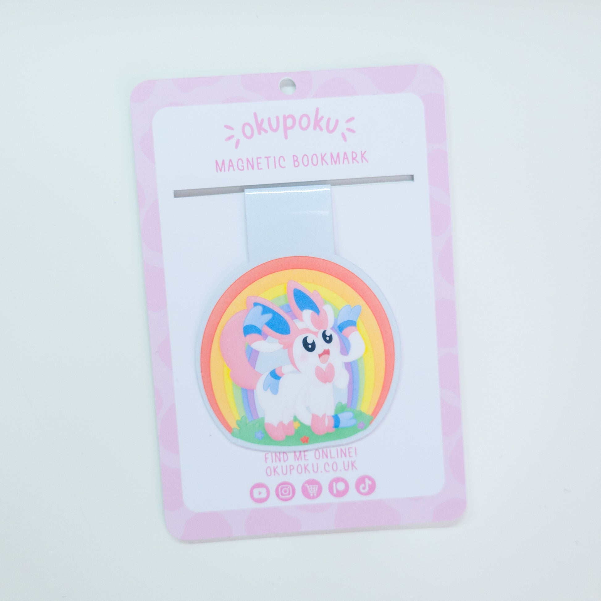 Sylveon magnetic bookmark with a rainbow behind her