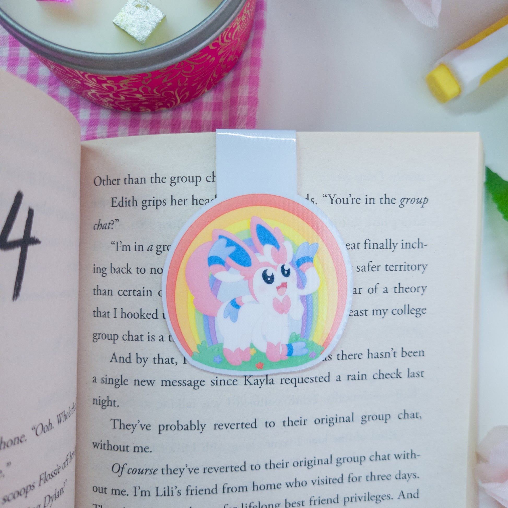 Sylveon magnetic bookmark with a rainbow behind her
