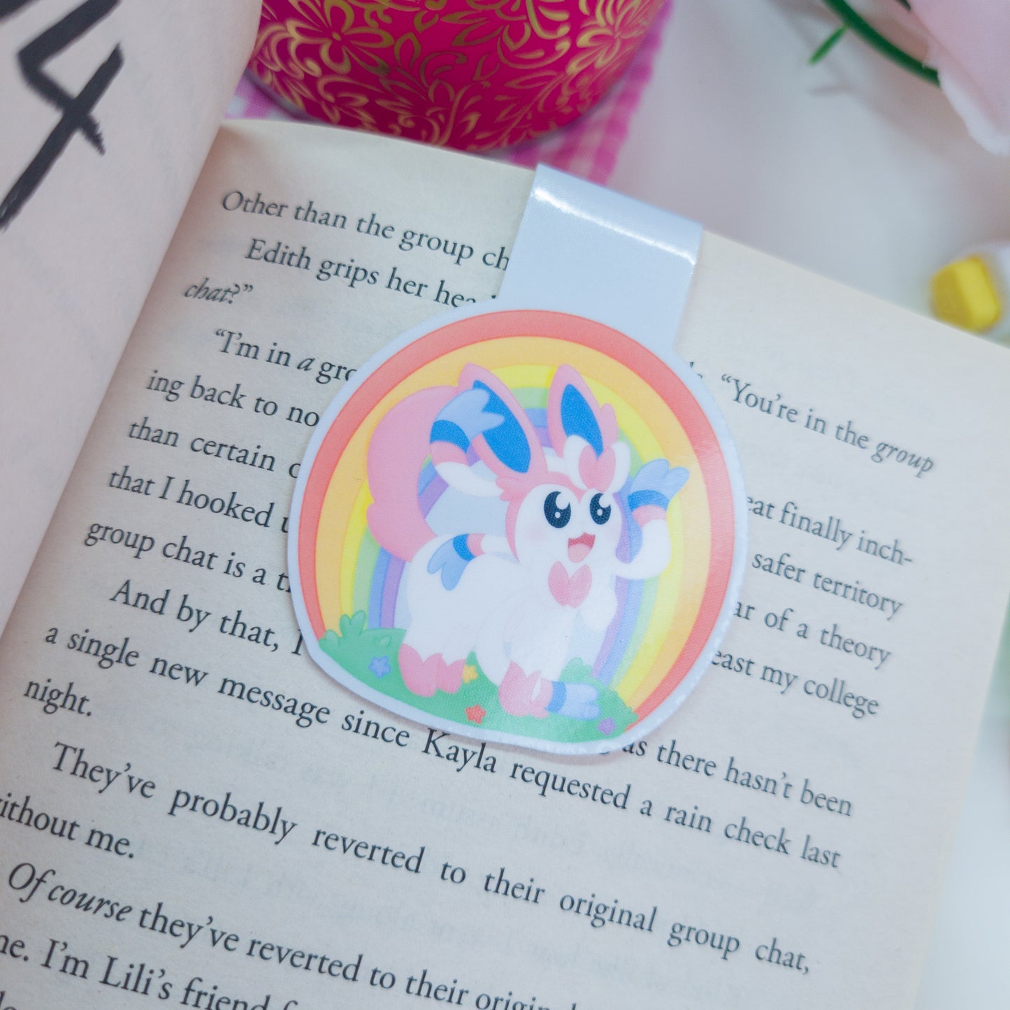 Sylveon magnetic bookmark with a rainbow behind her