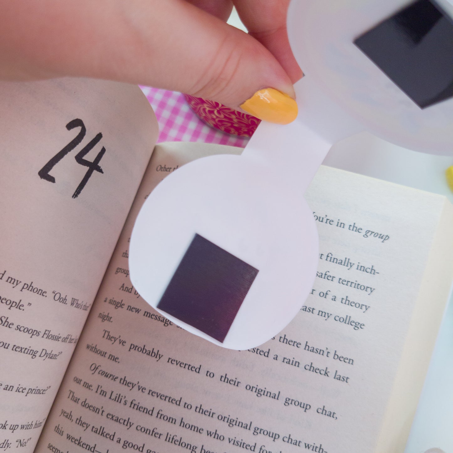 Sylveon magnetic bookmark with a rainbow behind her