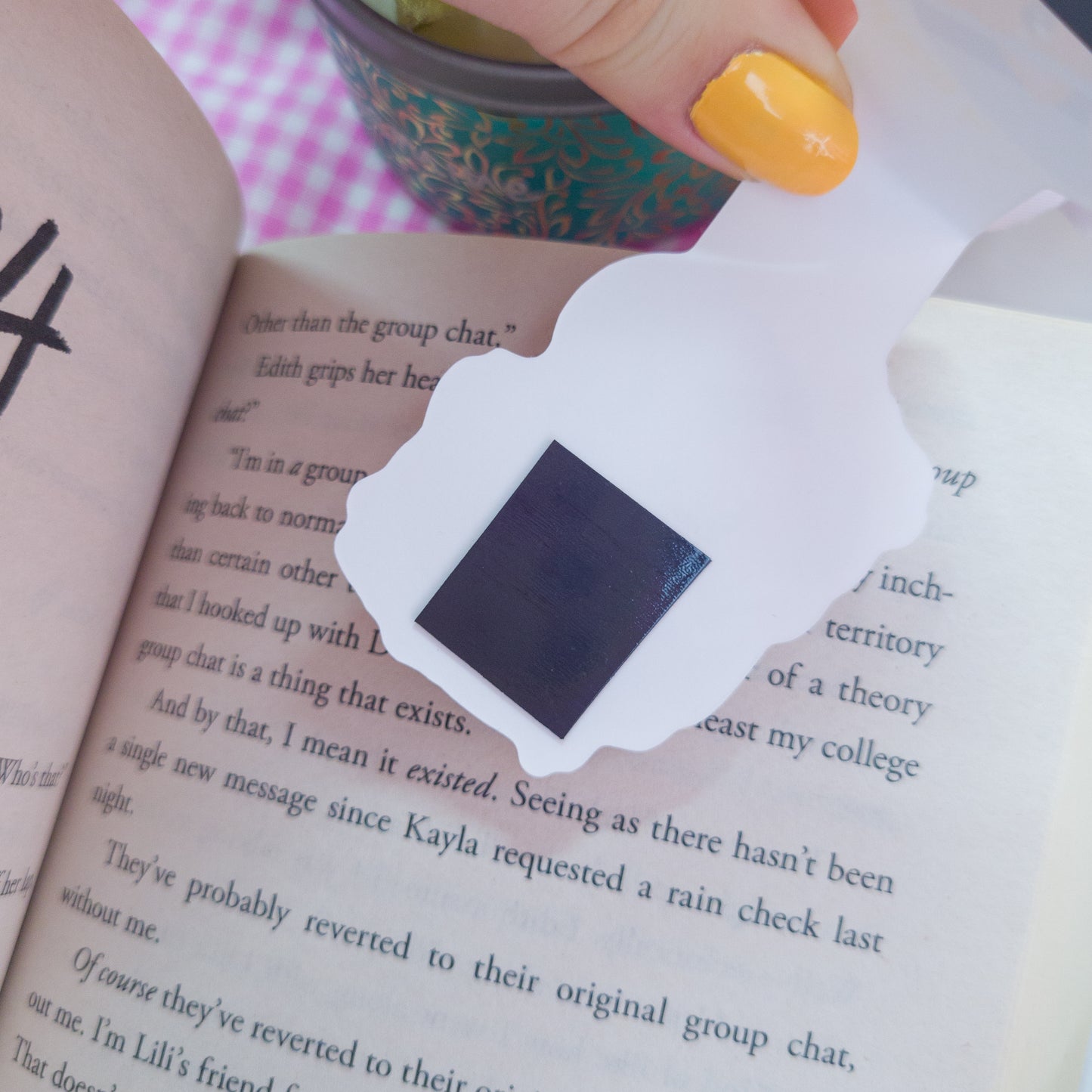 Katrina the Kitty Witch magnetic bookmark, featuring the text "Reading is Meowgical"