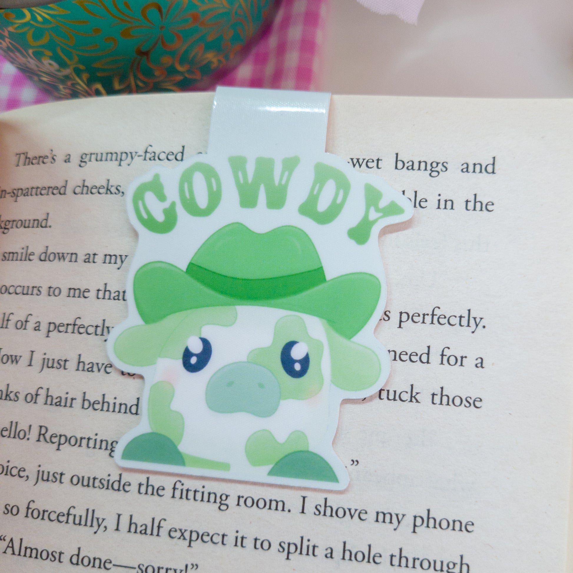 Matcha cowboy magnetic bookmark featuring the text "cowdy"