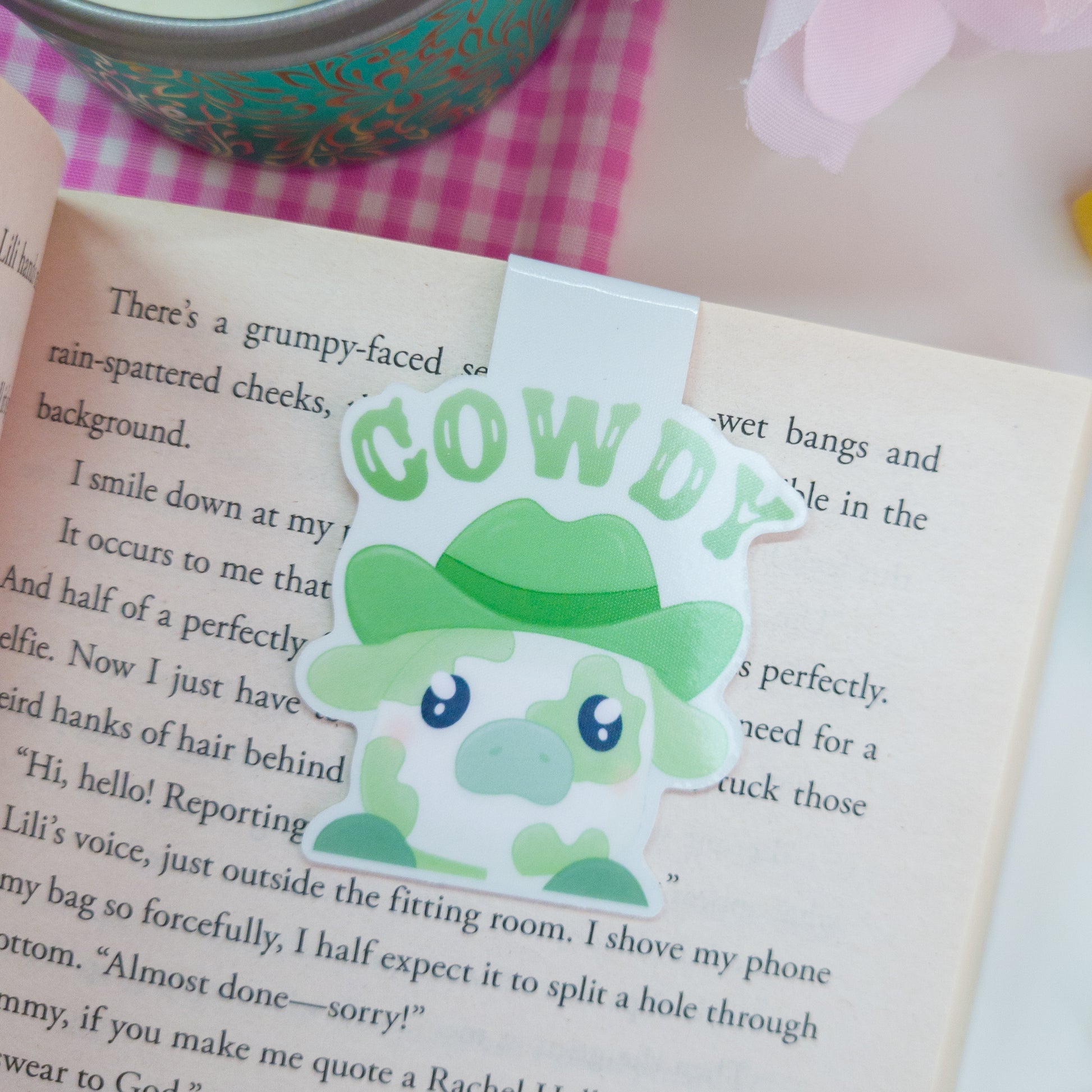 Matcha cowboy magnetic bookmark featuring the text "cowdy"