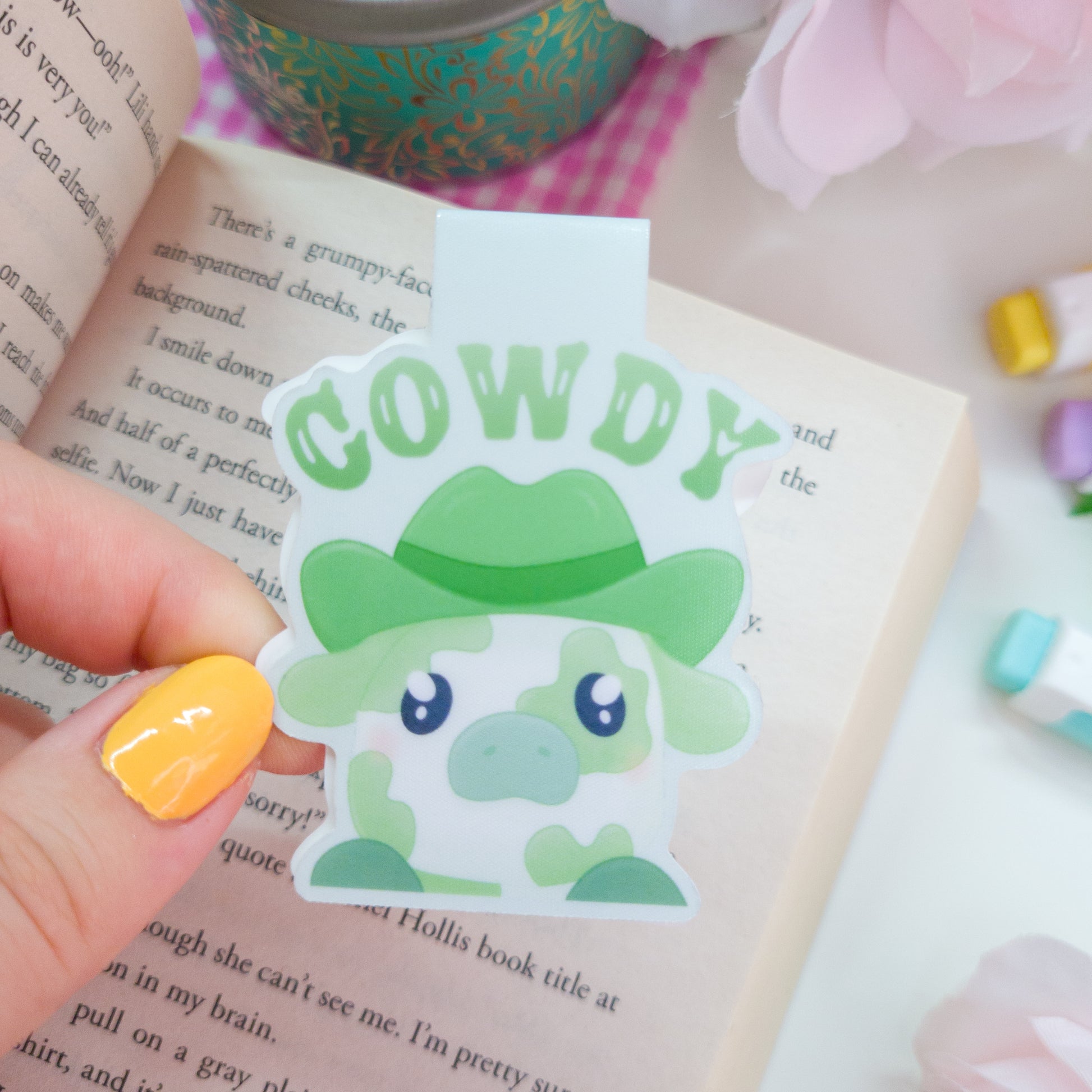 Matcha cowboy magnetic bookmark featuring the text "cowdy"