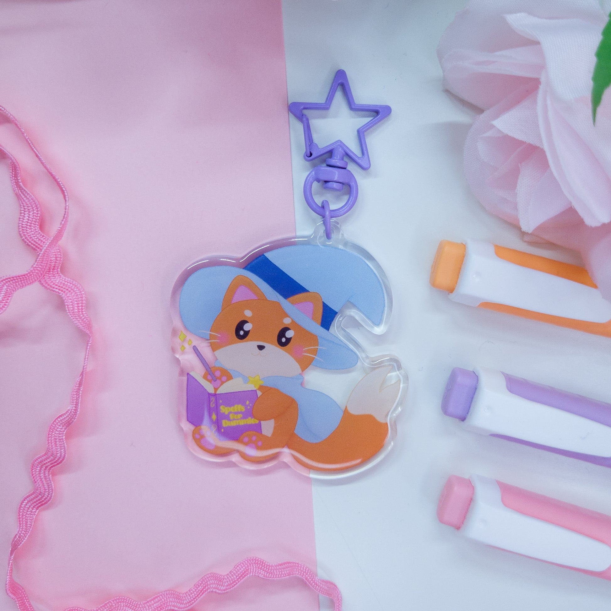 Katrina the kitty witch scryllic keychain with a purple star clasp