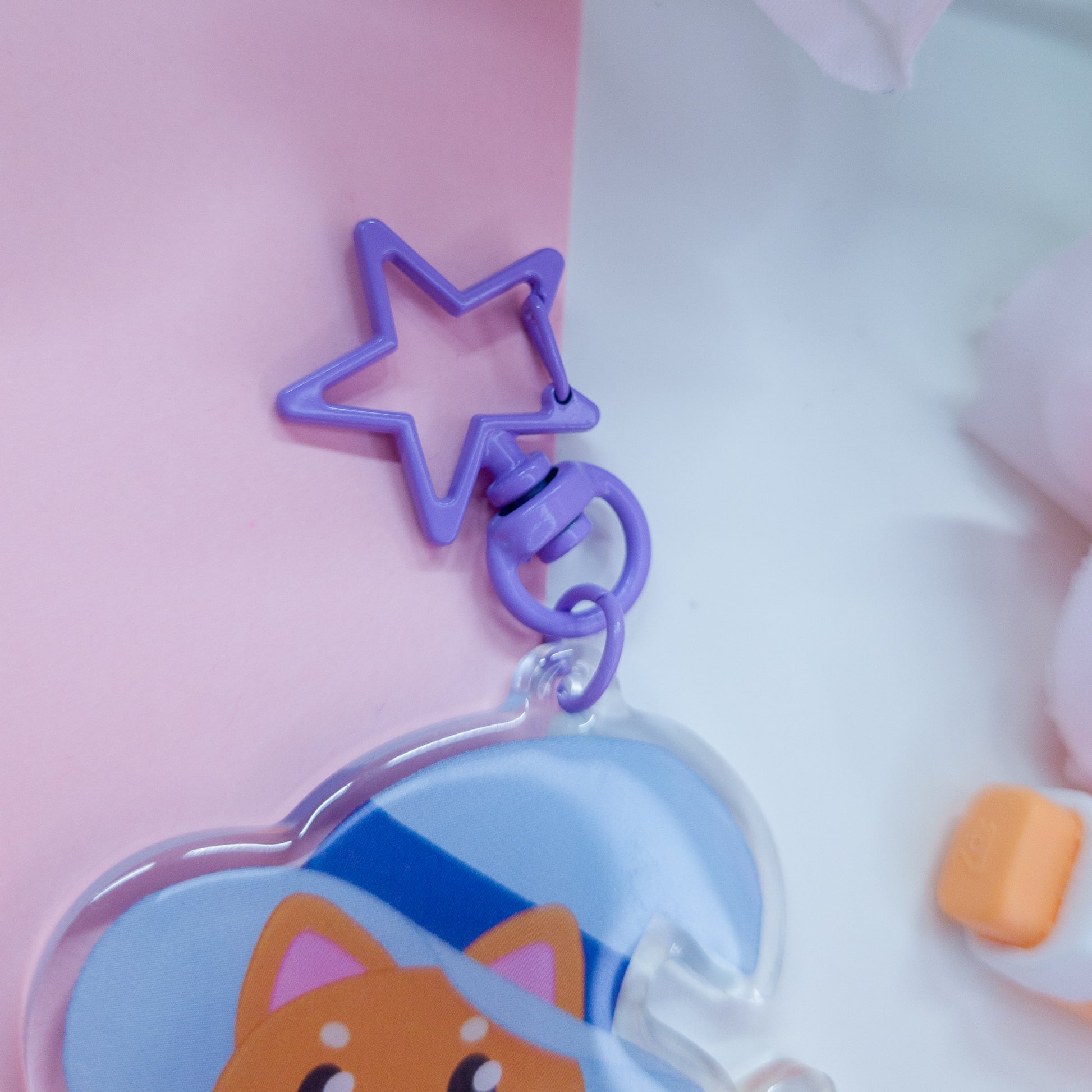 Katrina the kitty witch acryllic keychain with a purple star clasp