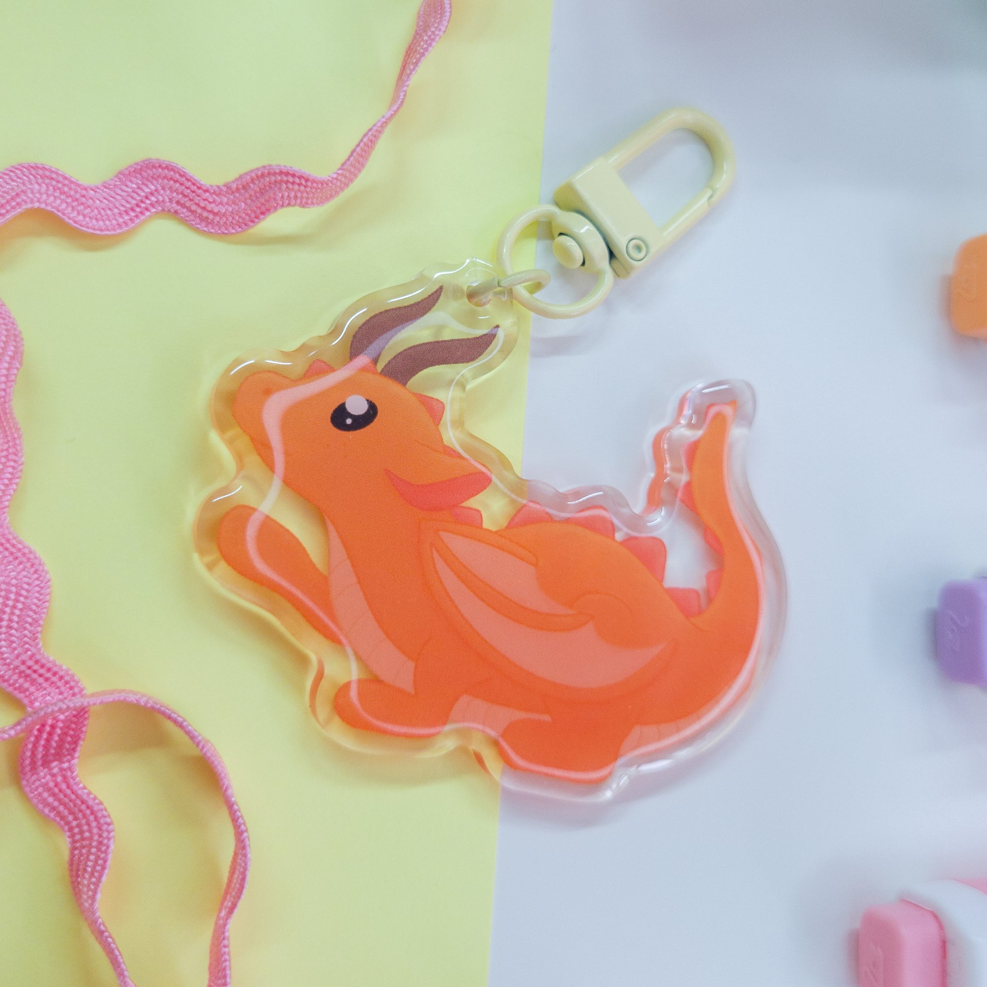 Cute orange forest dragon keychain called mimo