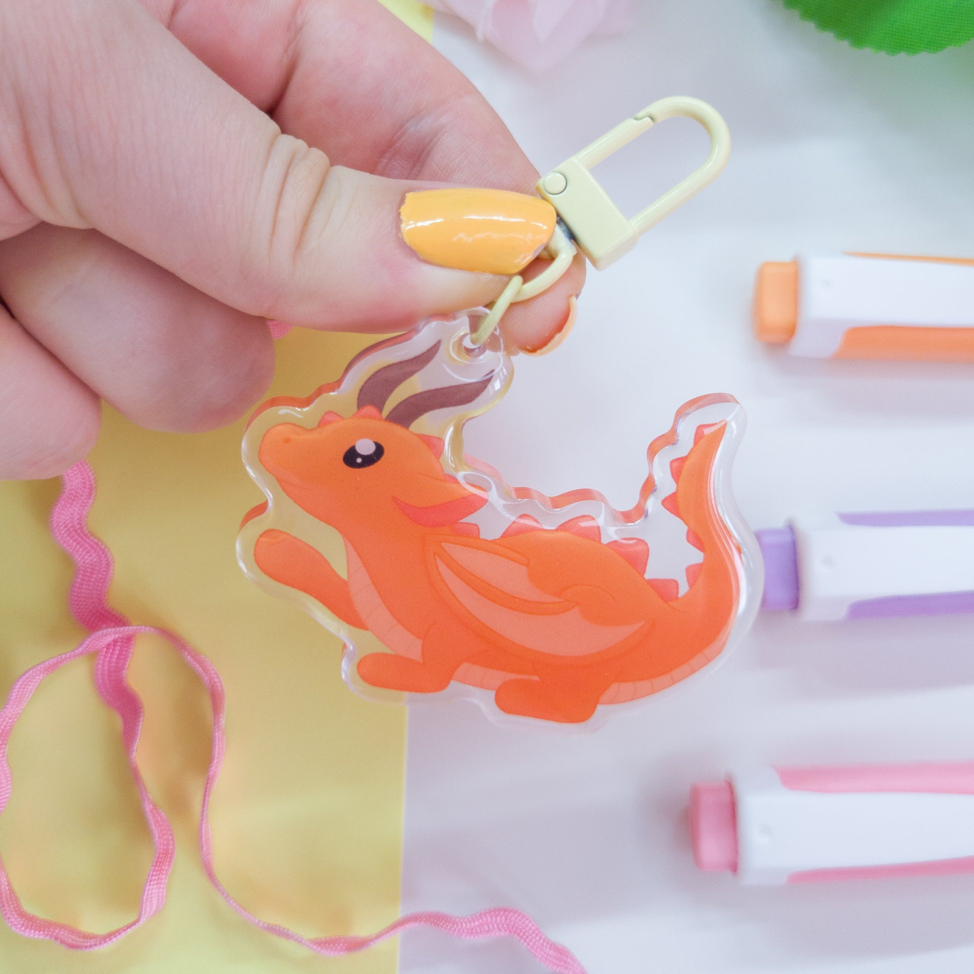 Cute orange forest dragon keychain called mimo