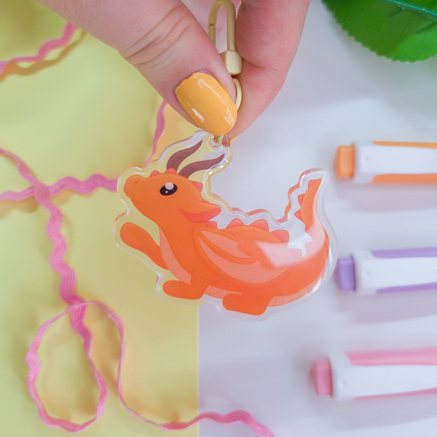 Cute orange forest dragon keychain called mimo