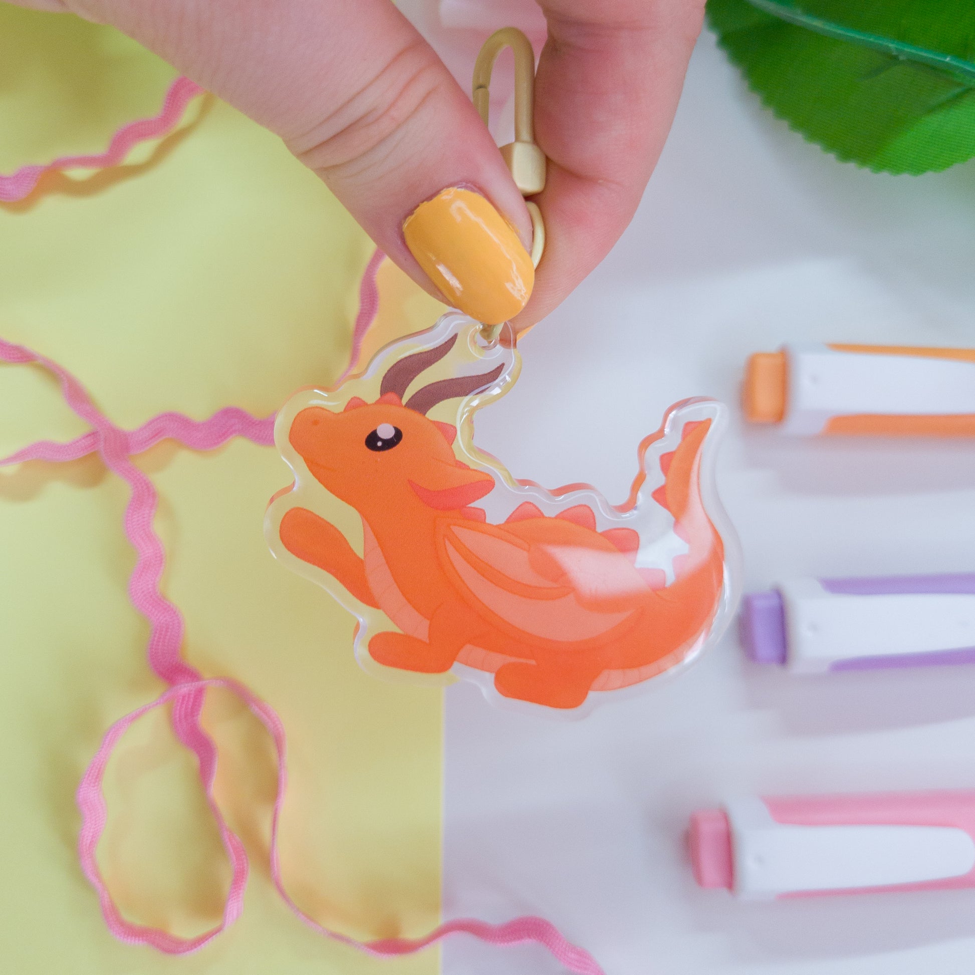 Cute orange forest dragon keychain called mimo