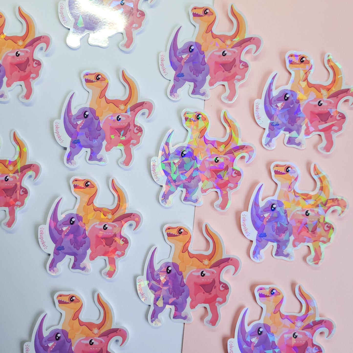 cute trio of velociraptors sticker