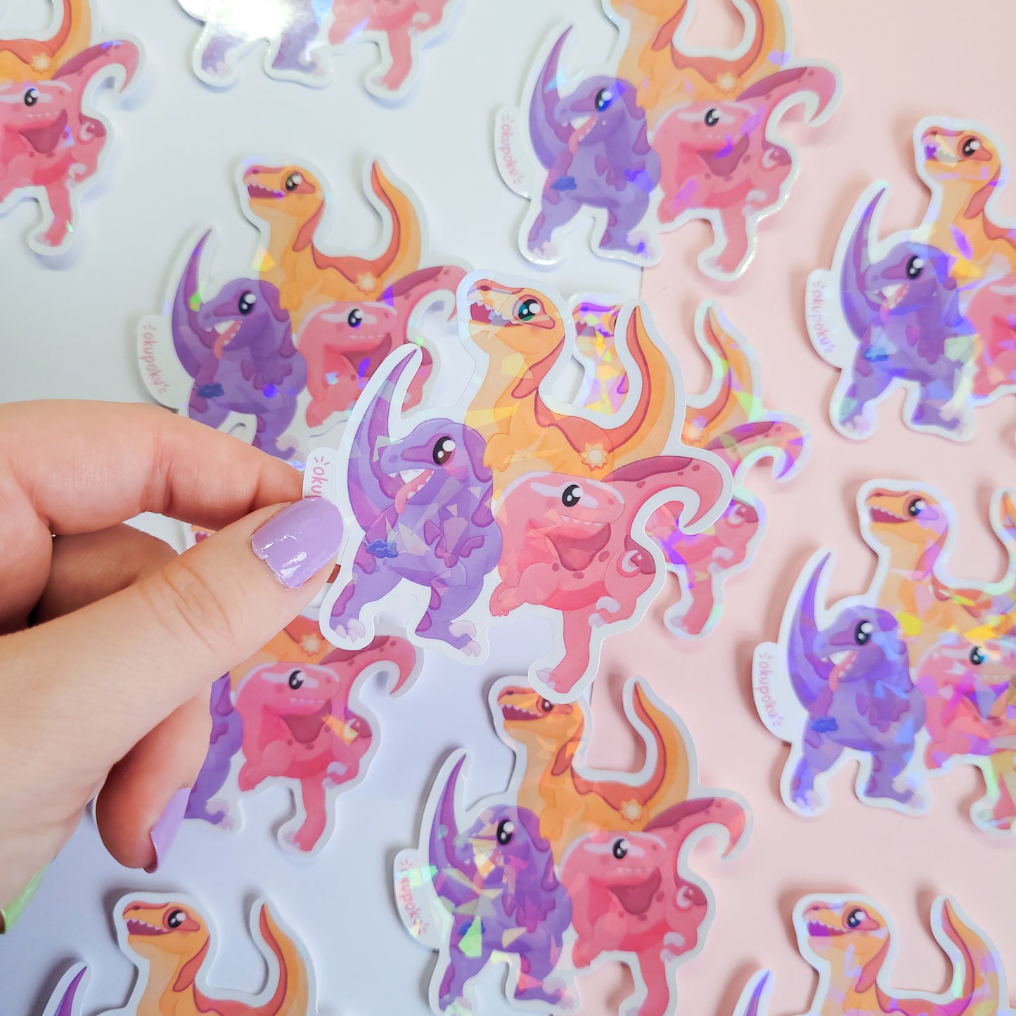 cute trio of velociraptors sticker