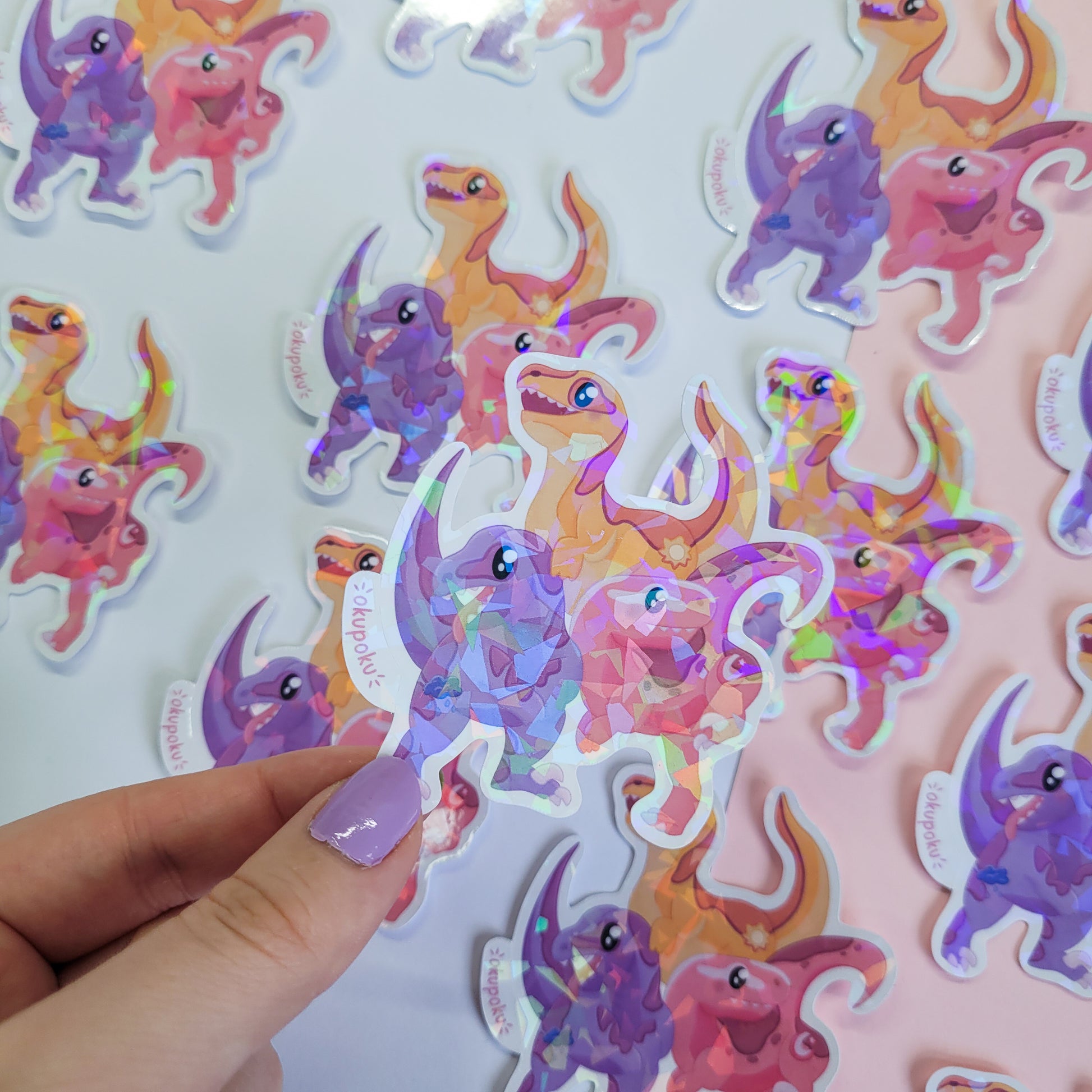 cute trio of velociraptors sticker