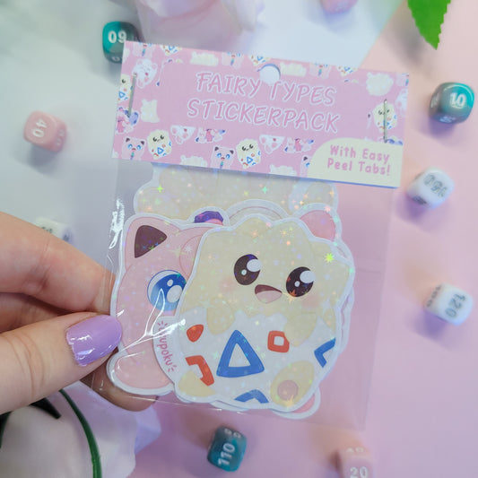 Fairy types stickerpack with a cute character design held by a hand.