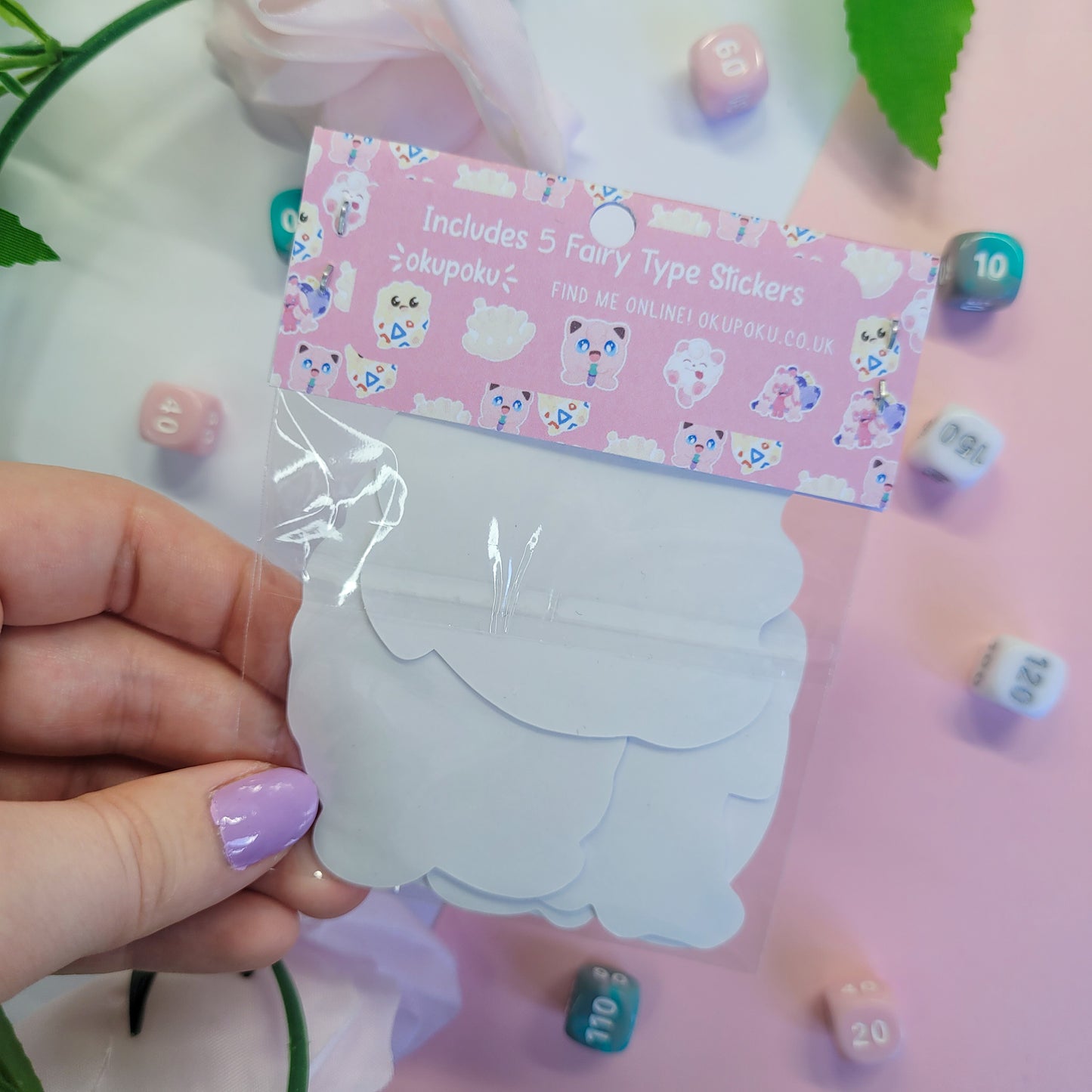 Fairy types stickerpack with a cute character design held by a hand.