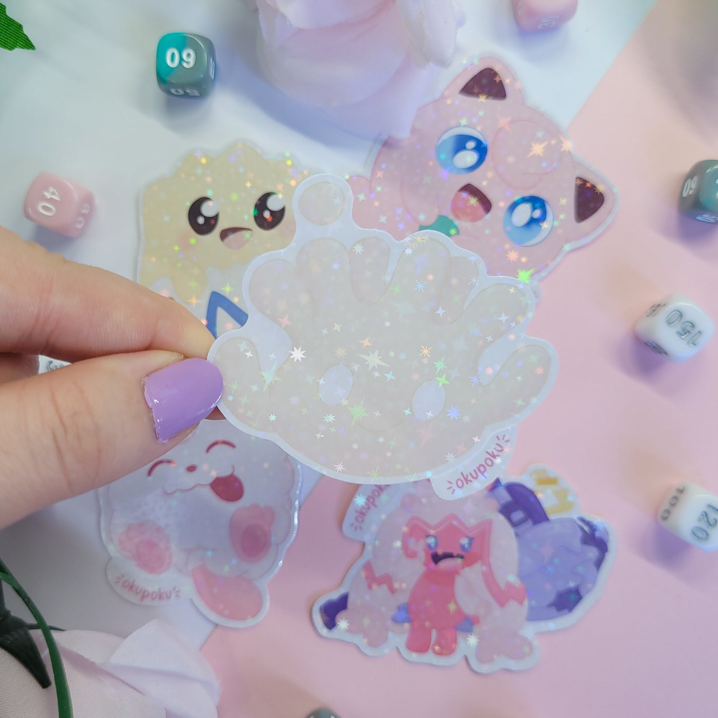 Fairy types stickerpack with a cute character design held by a hand.