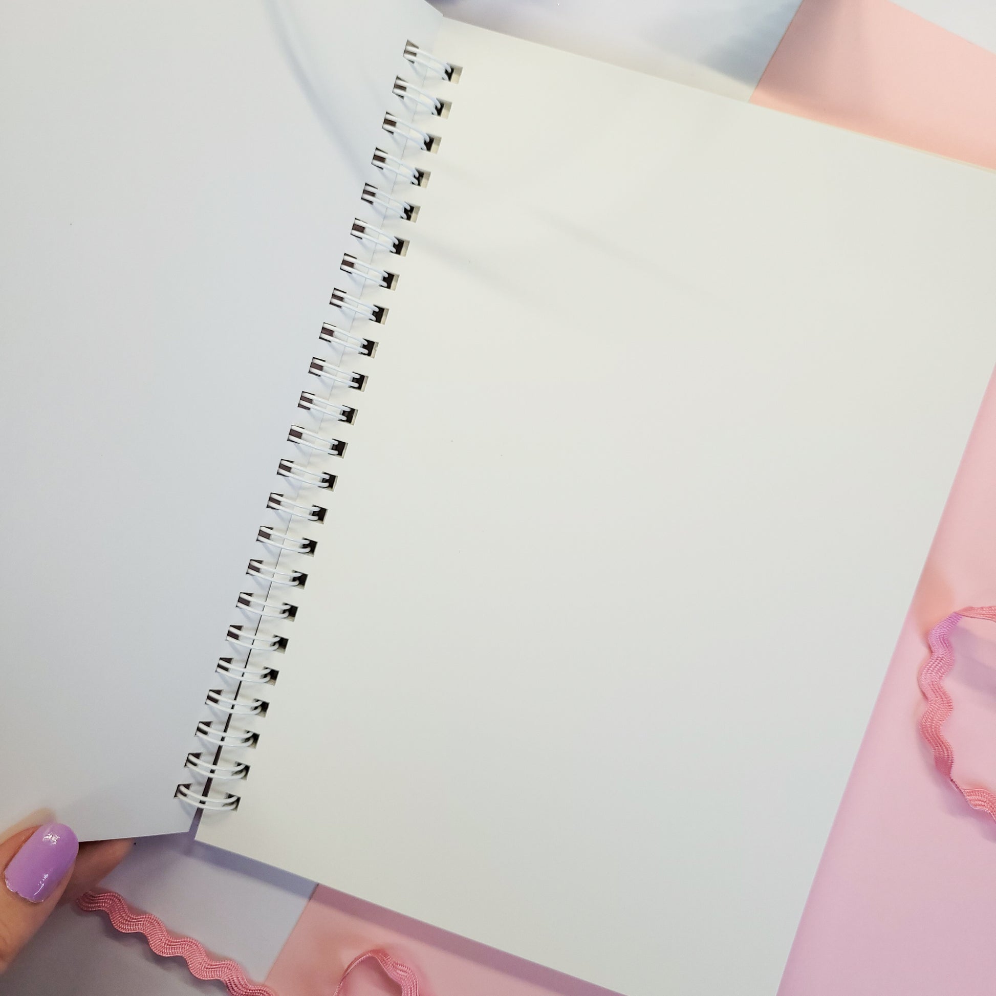 reusable sticker book with a Poké Ball design and 'Gotcha!' text on a pink background