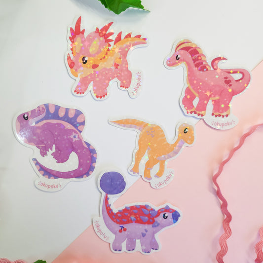 Set of colorful dinosaur stickers on a white background