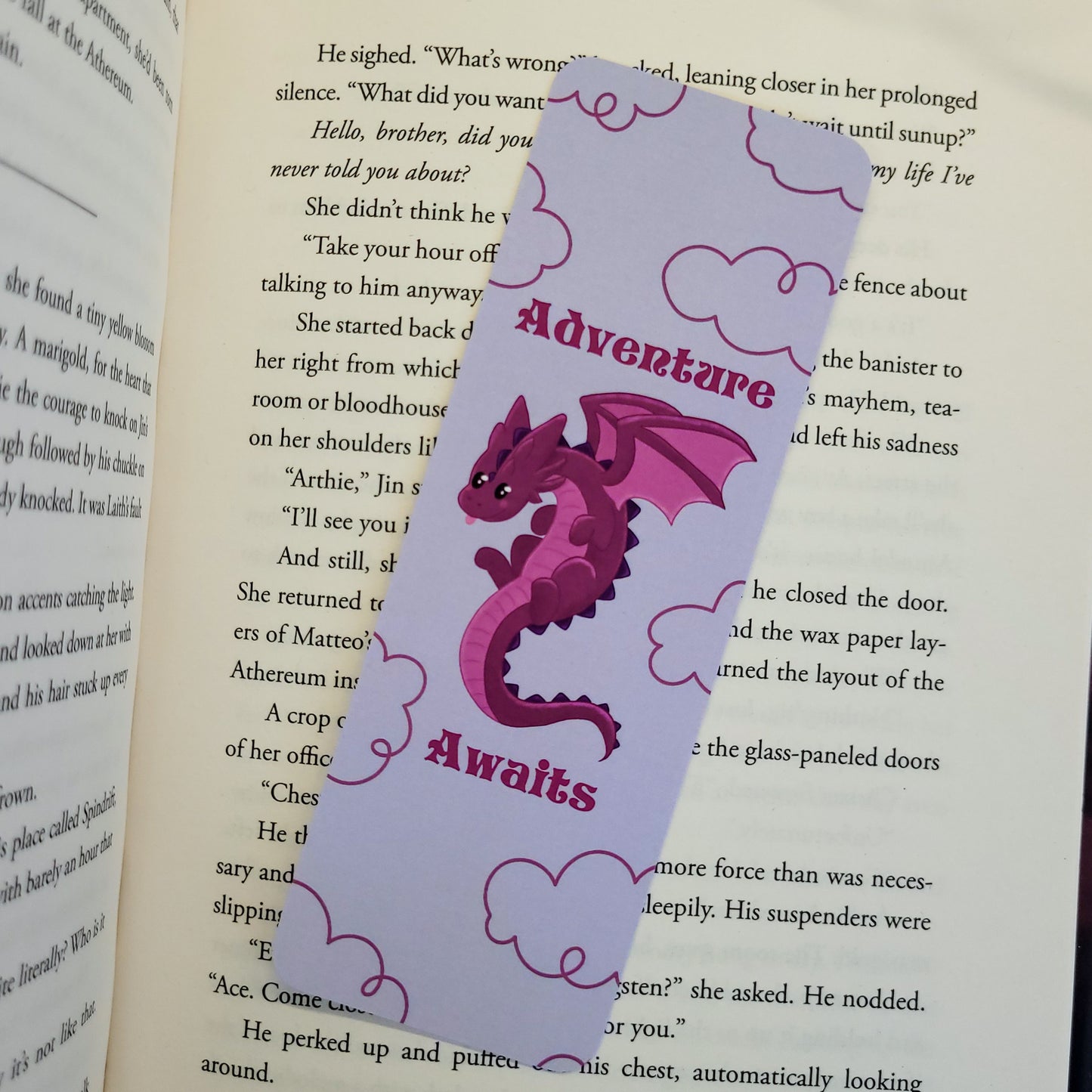 Blep the dragon bookmark with the text "adventure awaits"