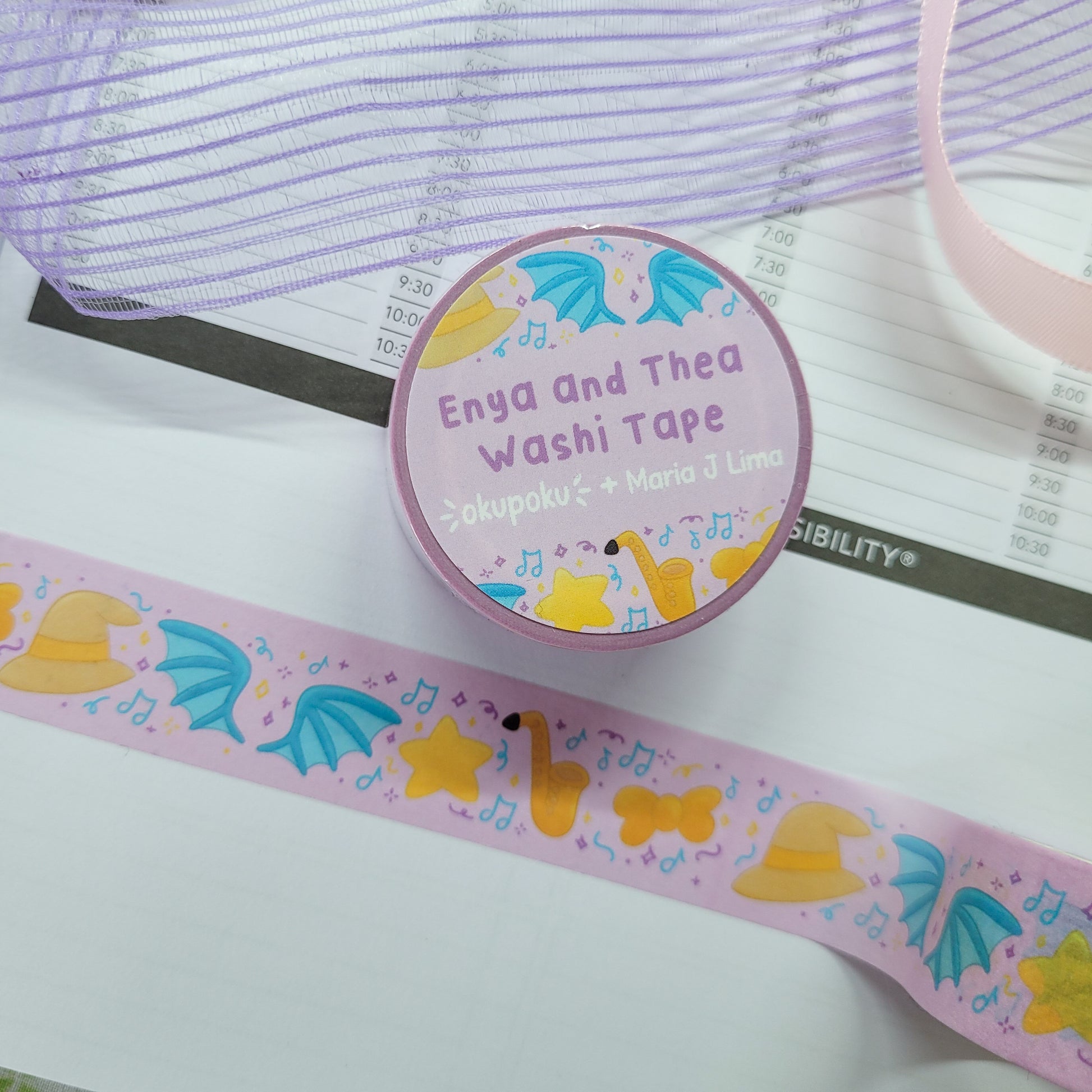 Enya and thea washi tape shown on a journal