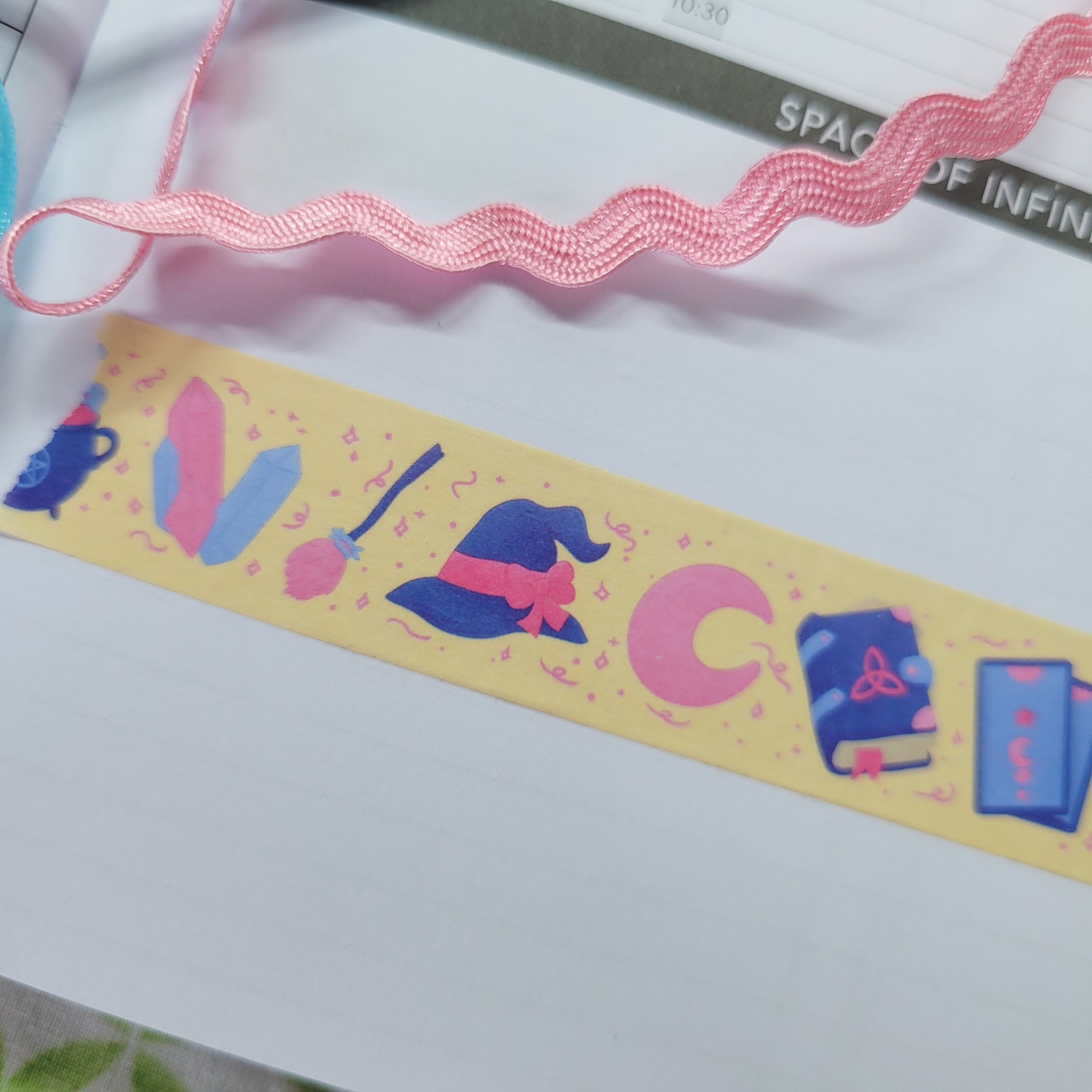 Little friendly witches shown in a journal