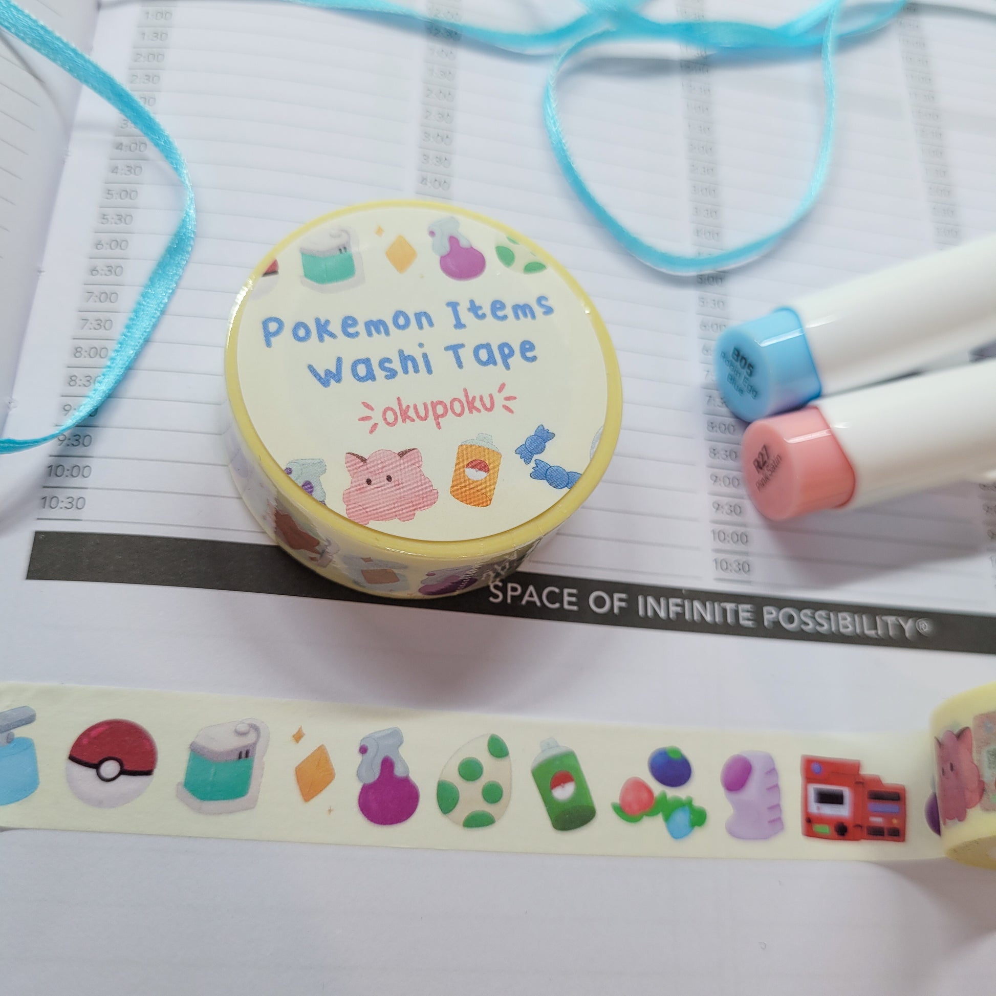 Pokemon Item washi tape being shown in a journal