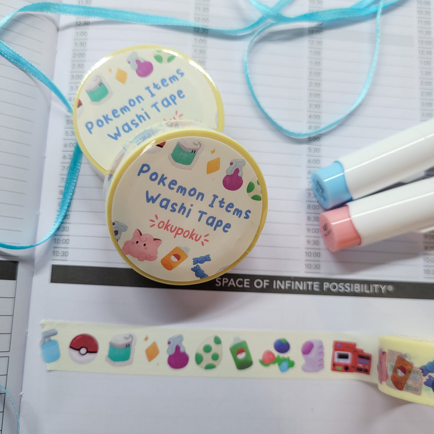 Pokemon Item washi tape being shown in a journal
