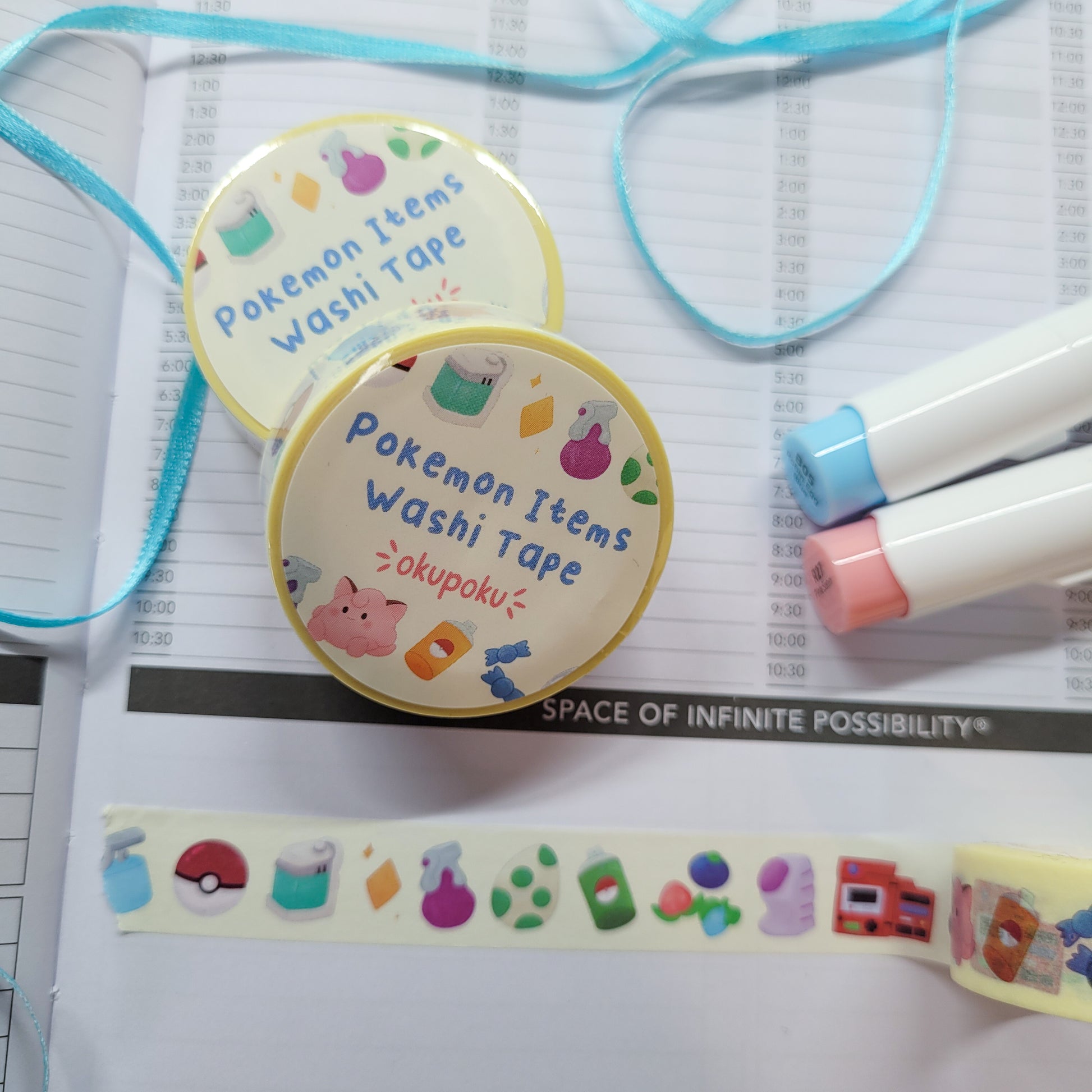 Pokemon Item washi tape being shown in a journal