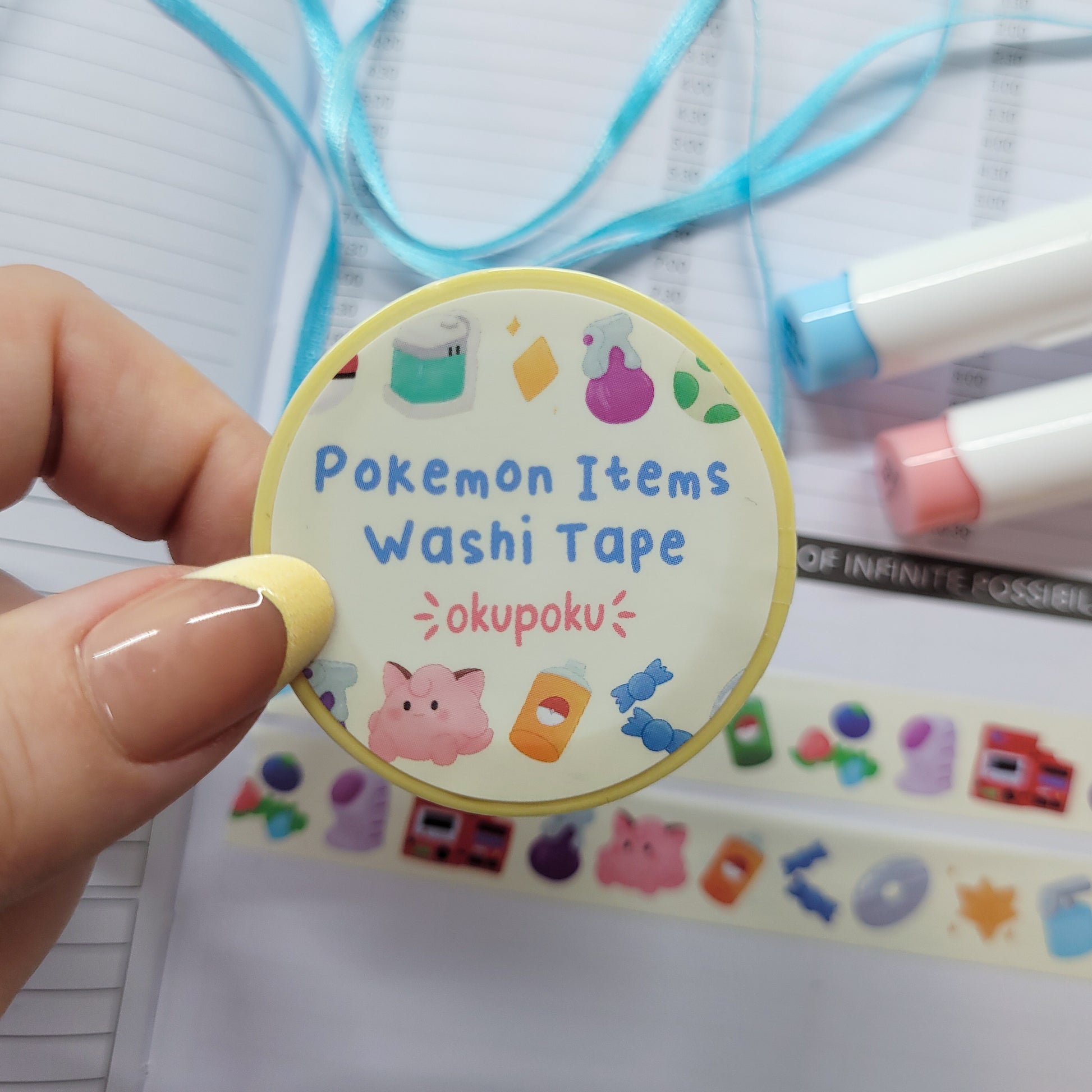 Pokemon Item washi tape being shown in a journal