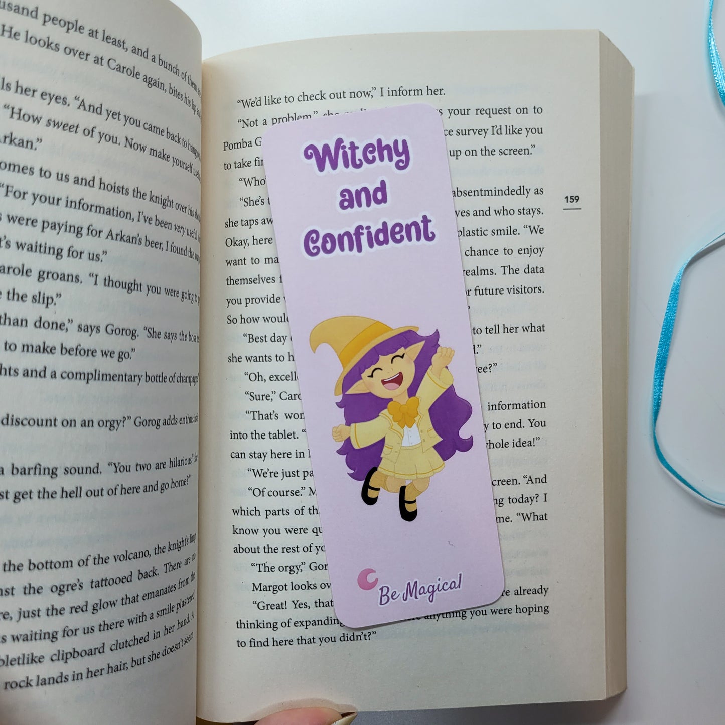 little witch on a bookmark with text witchy and confident