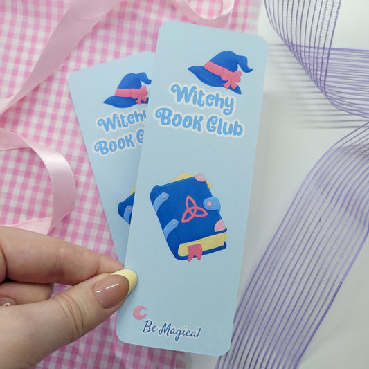 Witchy book club bookmark shown in use