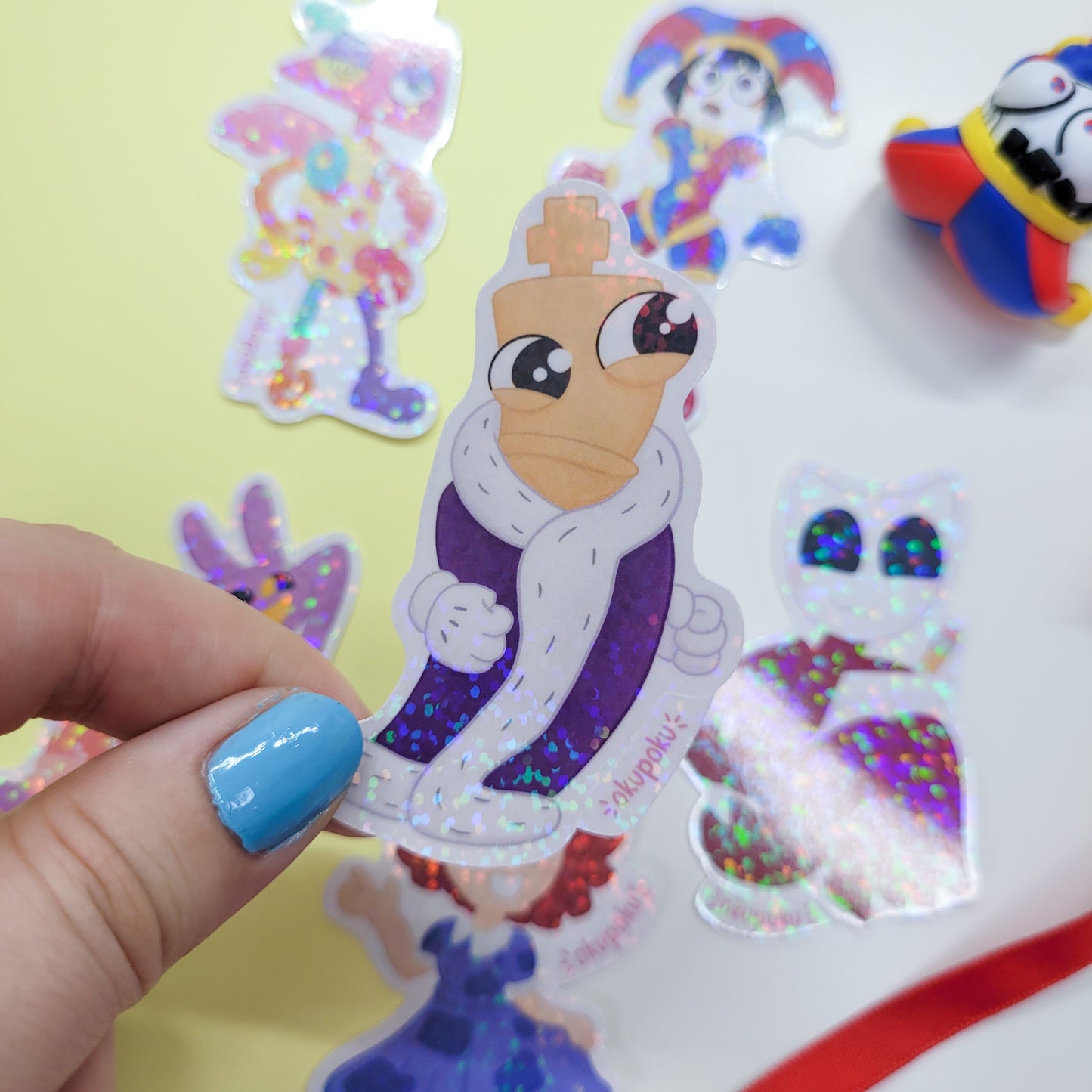 The Amazing Digital Circus sticker pack featuring the main six characters shown in use