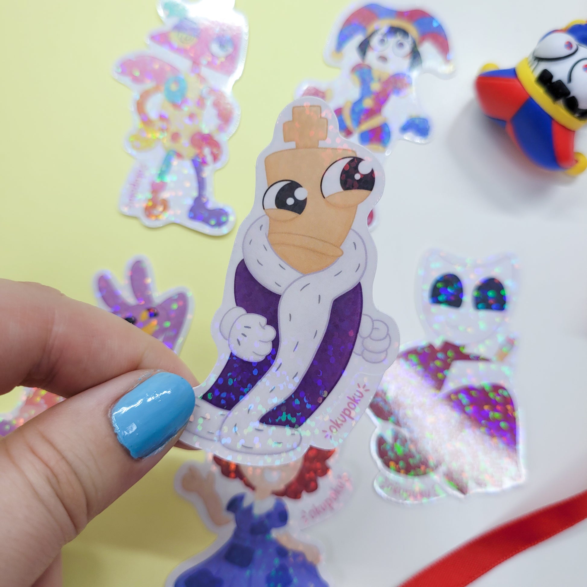 The Amazing Digital Circus sticker pack featuring the main six characters shown in use