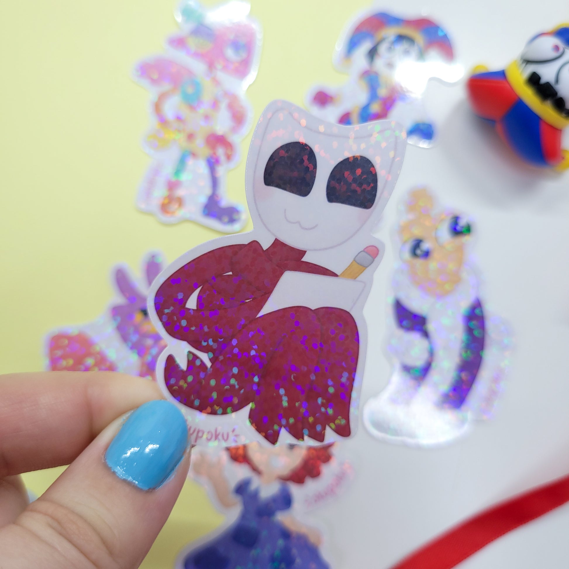 The Amazing Digital Circus sticker pack featuring the main six characters shown in use