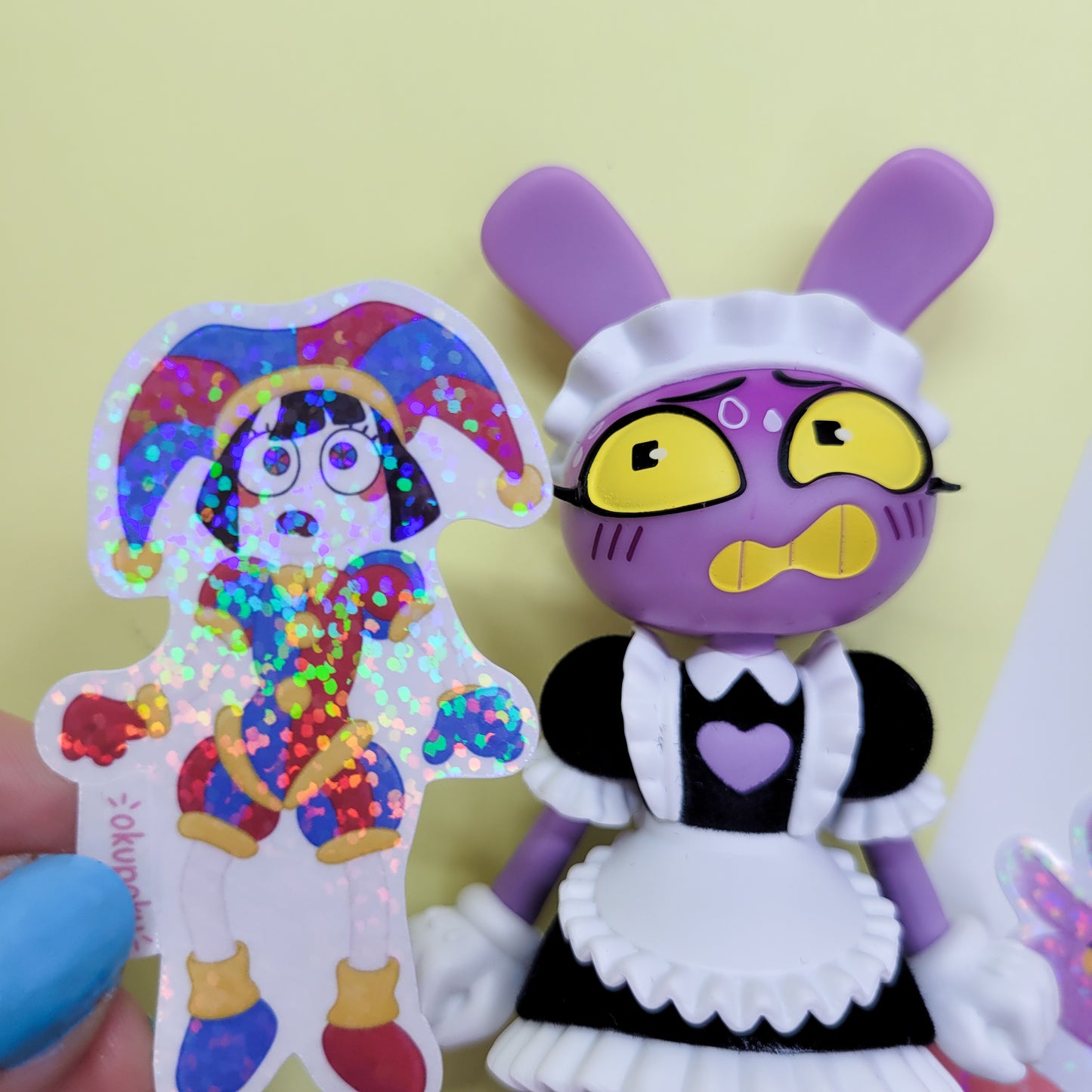 The Amazing Digital Circus sticker pack featuring the main six characters shown in use