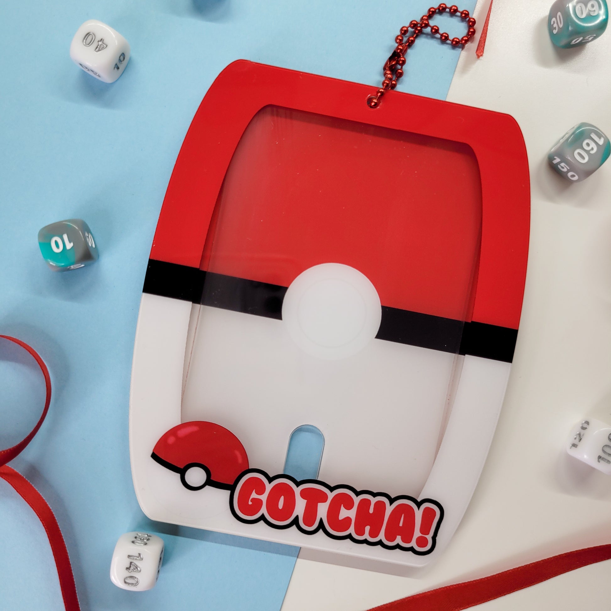 Pokeball themed photocard holder, featuring the text "gotcha!"