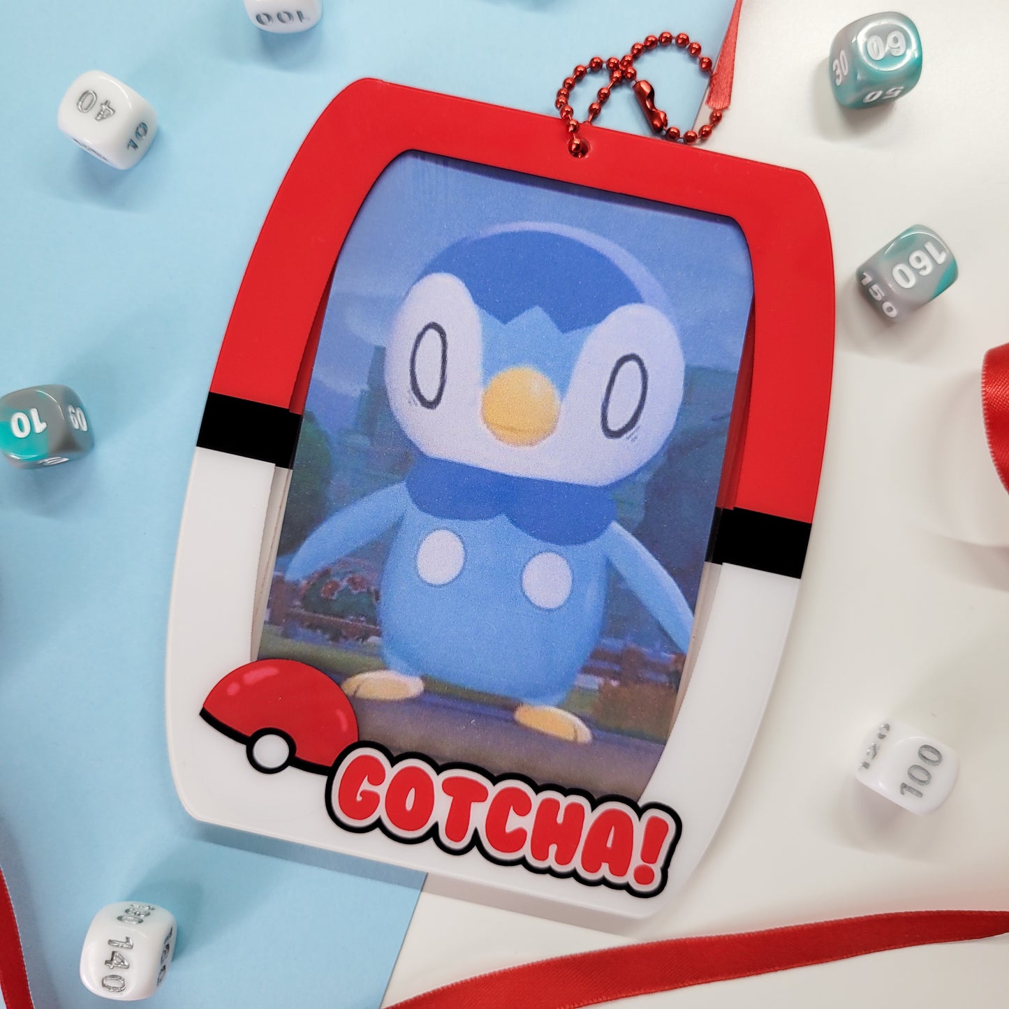 Pokeball themed photocard holder, featuring the text "gotcha!"